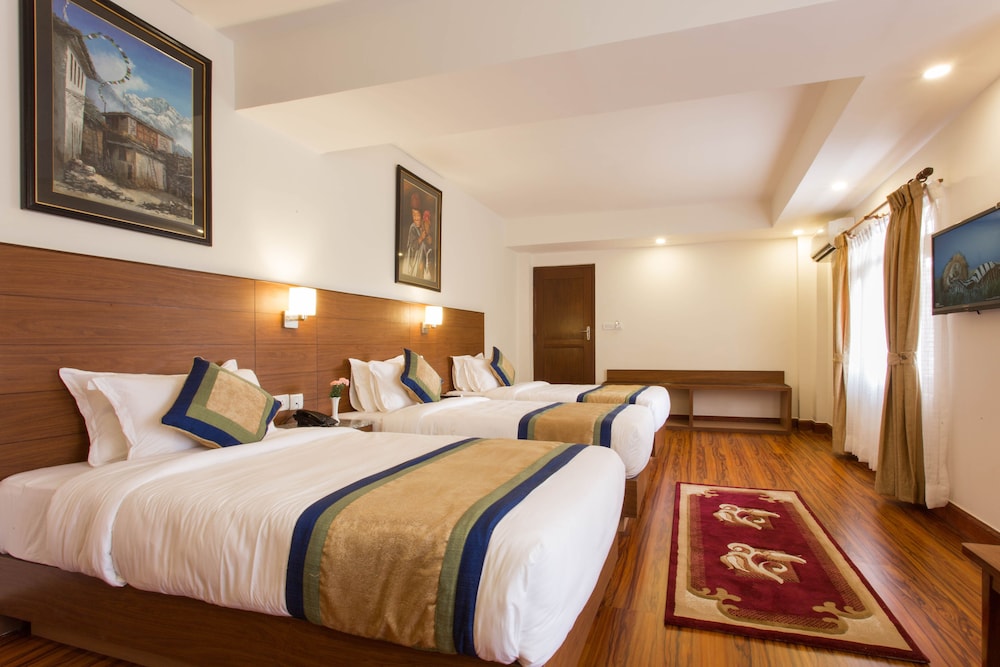 Deluxe Triple Room, 3 Twin Beds, Private Bathroom, Garden View photo 2