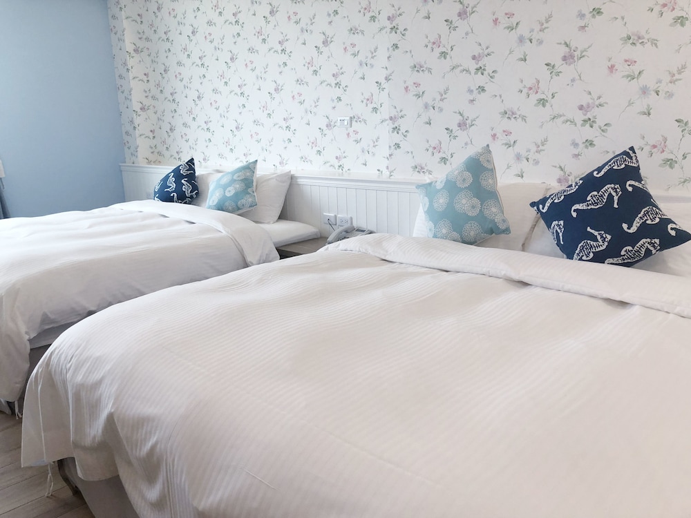 Gallery Quadruple Room, 2 Queen Beds, Courtyard Area photo 2