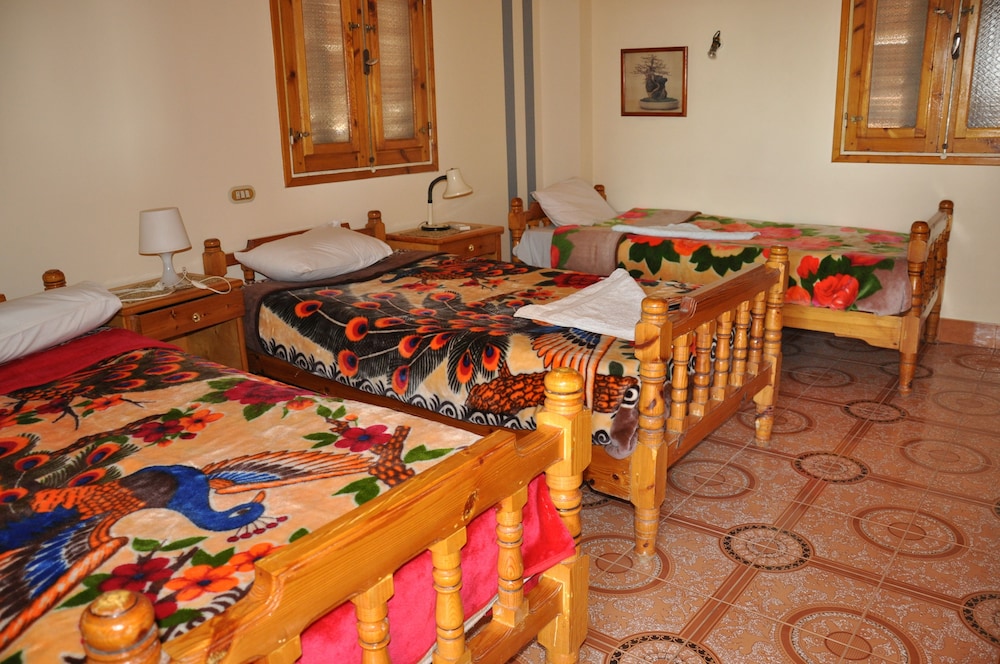 Deluxe Triple Room, Garden View photo 1