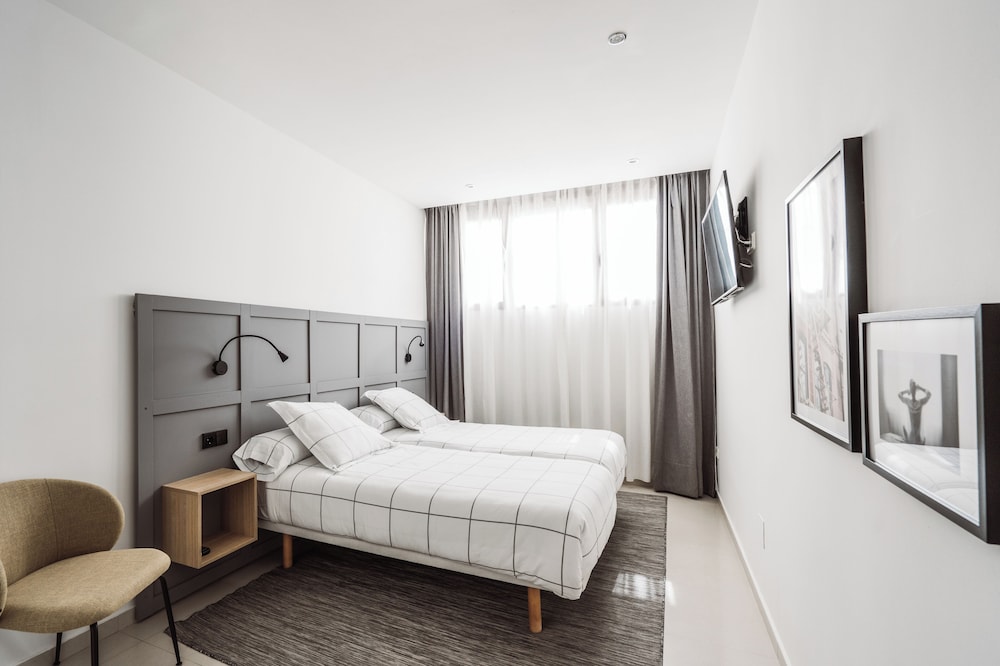 Habitación Doble Estándar, 2 Camas Individuales, Aire Acondicionado, Vista al Jardín