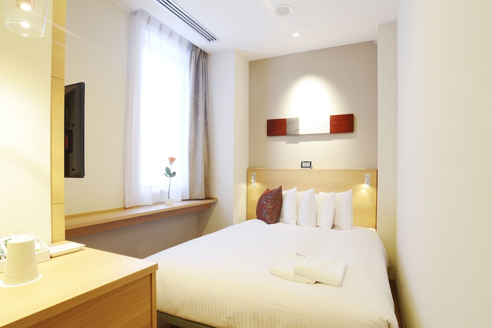 Connecting Room (Double Room with Shower Booth &  Economy Double Room with Unit Bath) photo 3