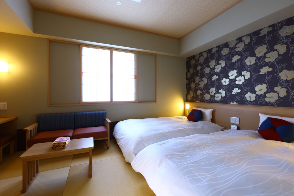 Moderate Twin Room, Non Smoking, No Housekeeping - Photo 1