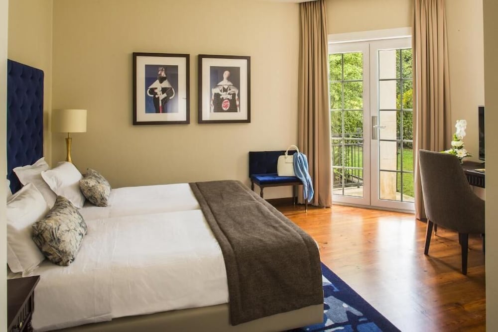Deluxe Room - Photo 5