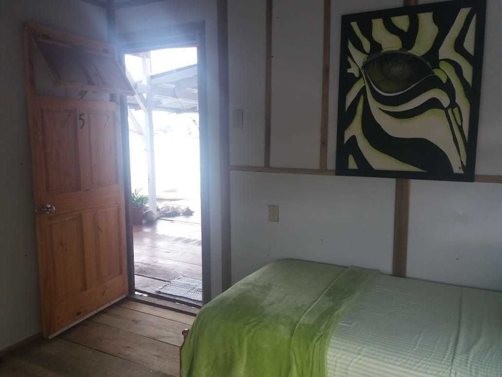Basic Triple Room, Multiple Beds, Shared Bathroom, Sea View photo 3