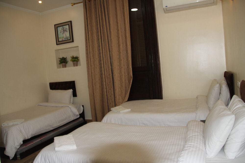 Triple Room, Private Bathroom - Photo 8