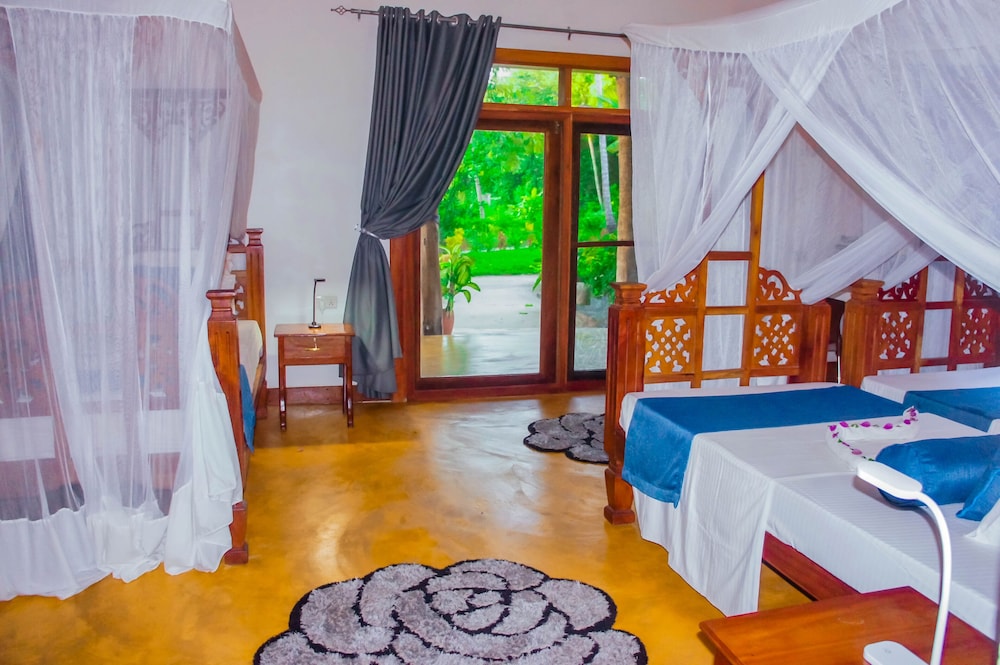 Deluxe Triple Room, Non Smoking, Garden View photo 2