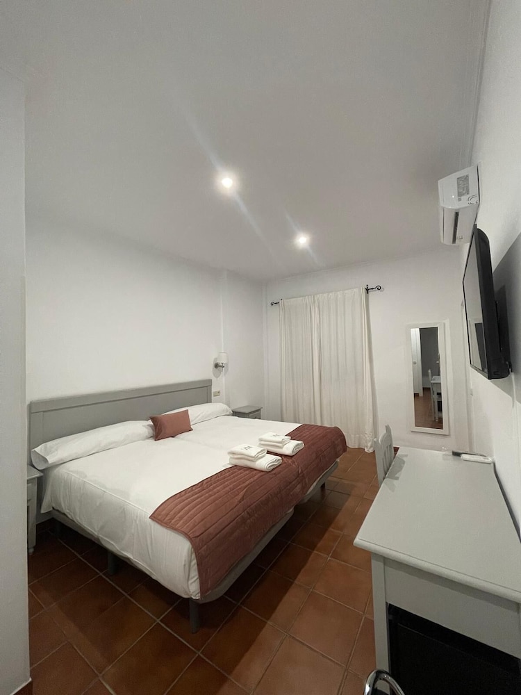 Habitación Triple Confort, Vista al Jardín
