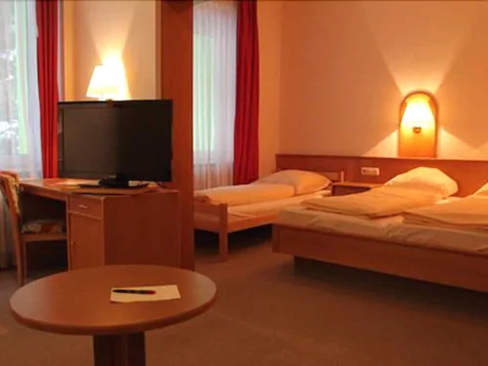 Triple Room - Photo 1