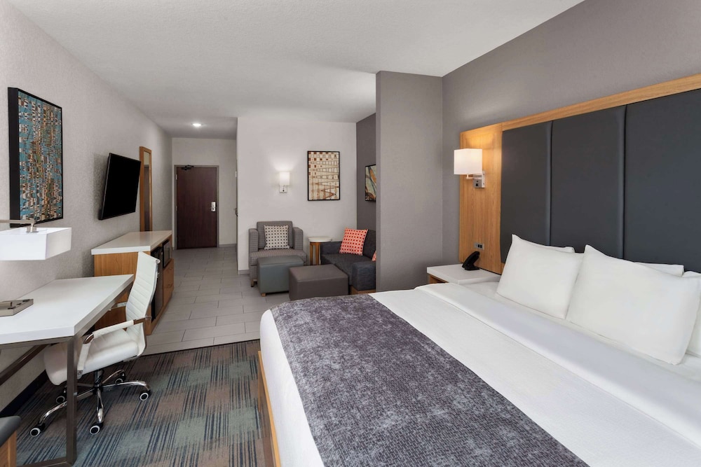 Suite, 1 King Bed with Sofa bed, Roll-in Shower (2 TVs, Mobility Accessible) photo 1