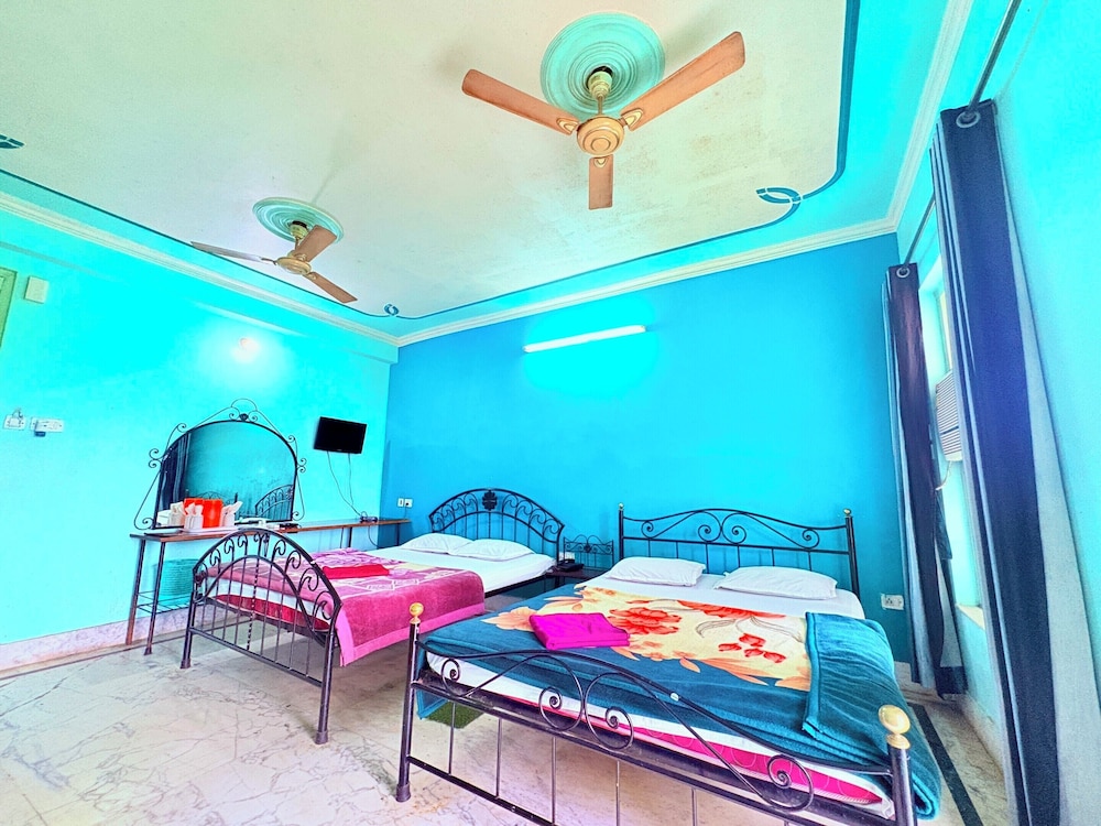 Deluxe Quadruple Room, City View