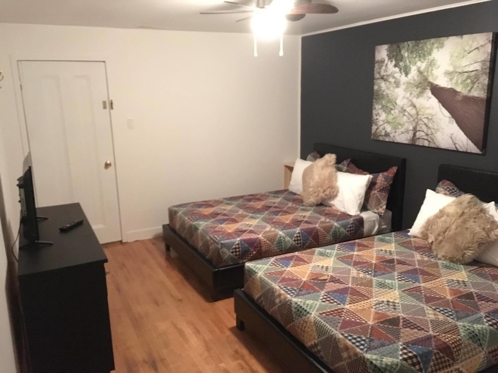 Economy Quadruple Room, 2 Double Beds, Non Smoking, Shared Bathroom photo 1