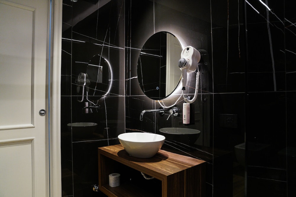 Deluxe Triple Room - Photo 11