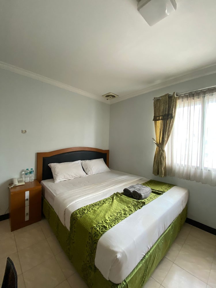 Deluxe Room - Photo 6
