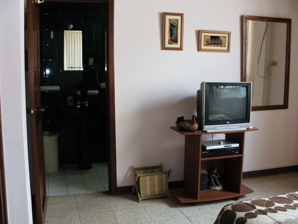 Classic Triple Room, 1 Queen Bed With Sofa Bed, Private Bathroom, Courtyard View photo 2