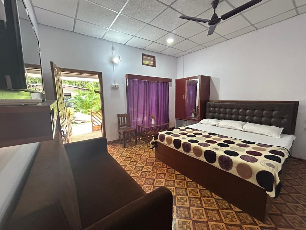 Deluxe Room - Photo 10