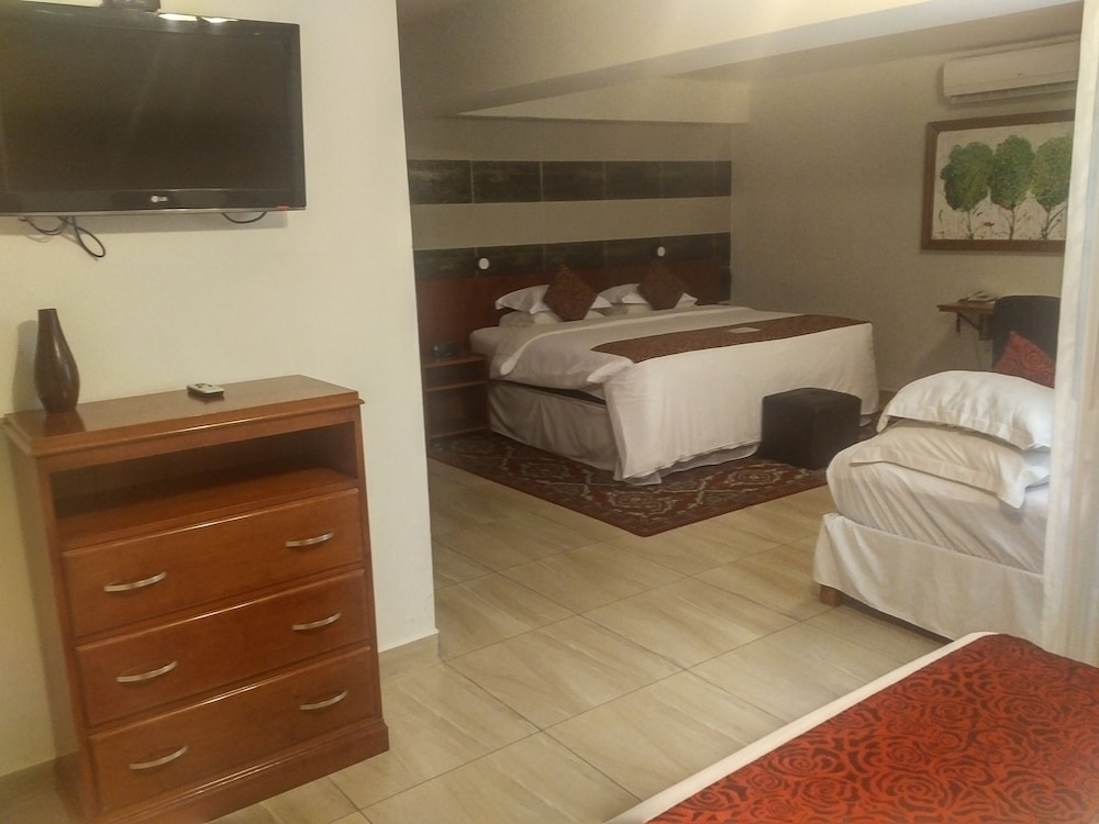 Economy Quadruple Room, Multiple Beds - Photo 4