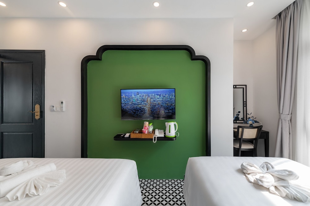 Deluxe Triple Room - Photo 8