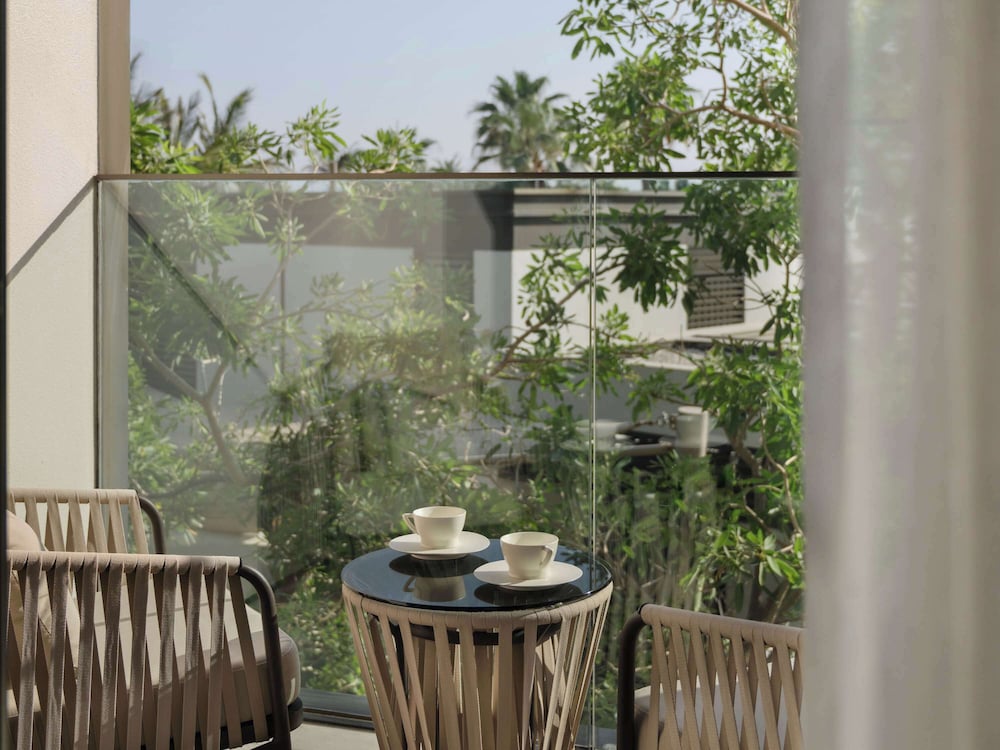 Rising Light TWIN Guestroom with Patio - Garden View