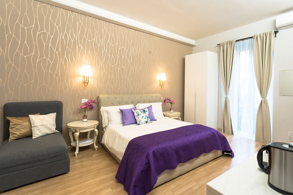 Deluxe Quadruple Room, Balcony photo 1