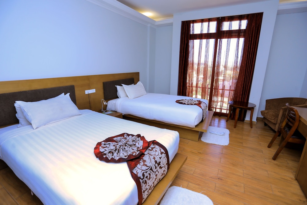Standard Twin Room - Photo 2
