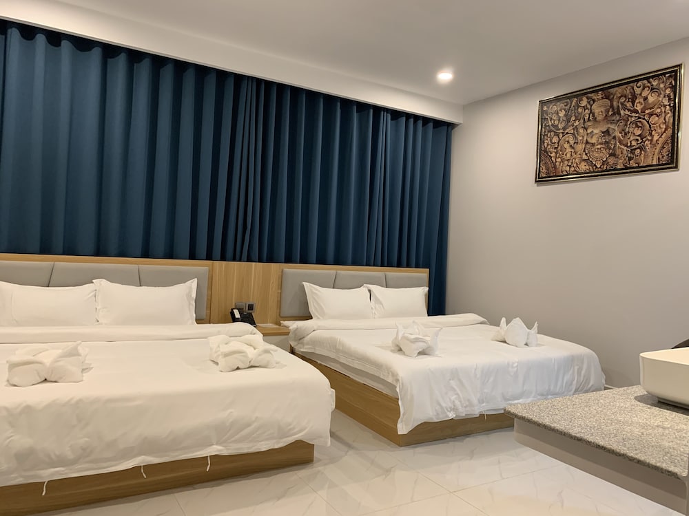Deluxe Quadruple Room - Photo 4