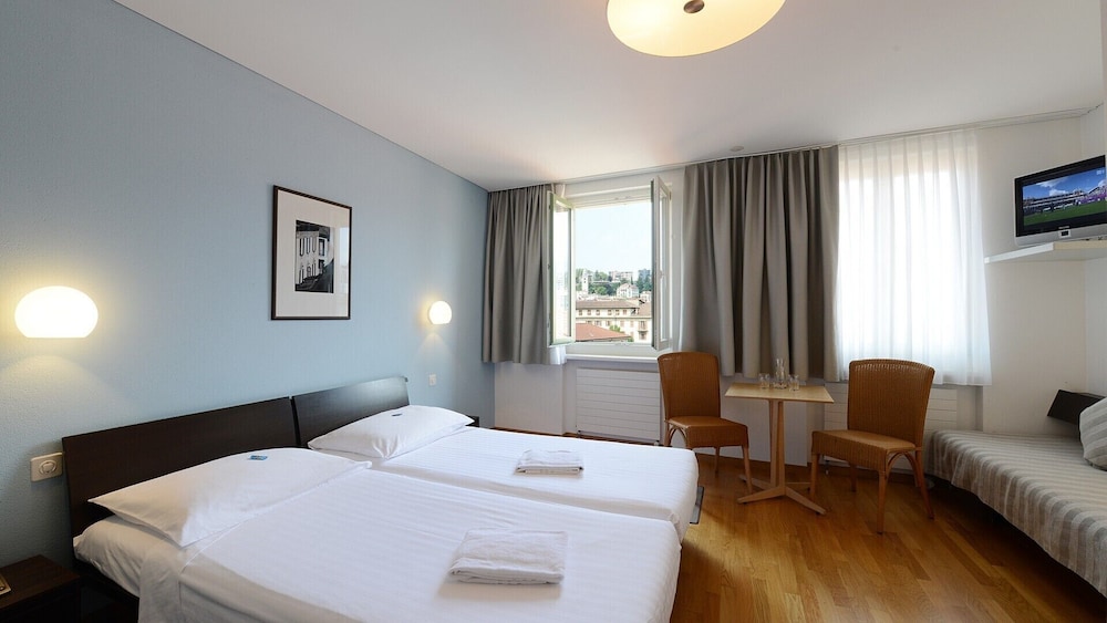 Classic Triple Room photo 2