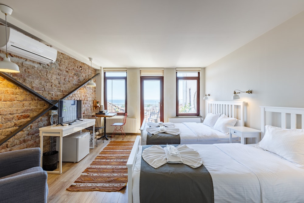 Panoramic Triple Room, Multiple Beds, Sea View, Sea Facing photo 1