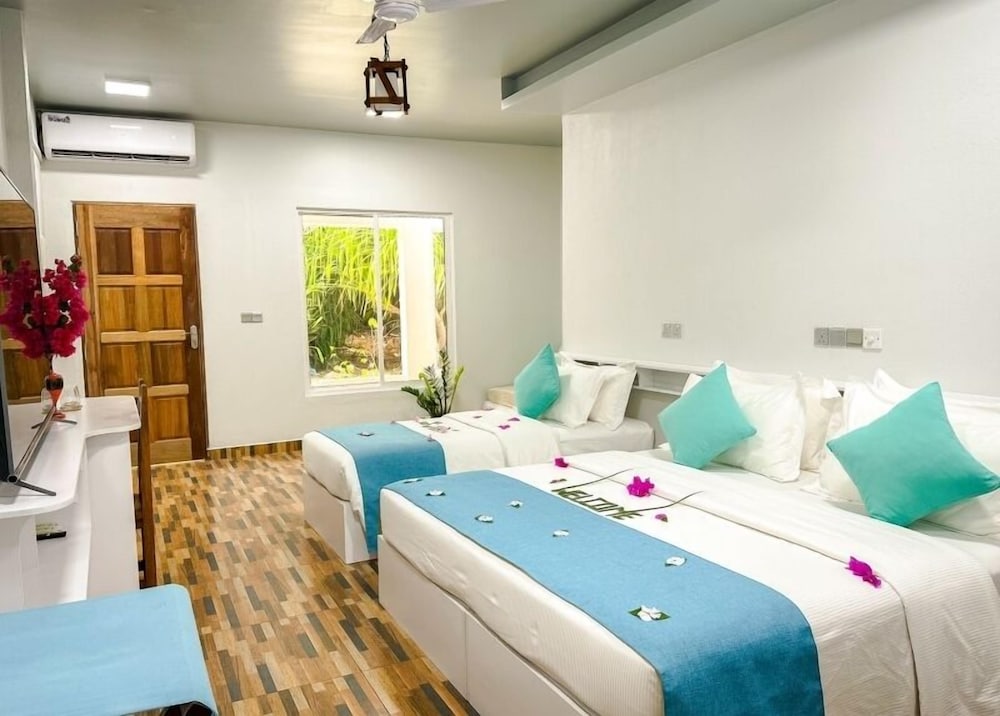 Family Quadruple Room, Garden View photo 3