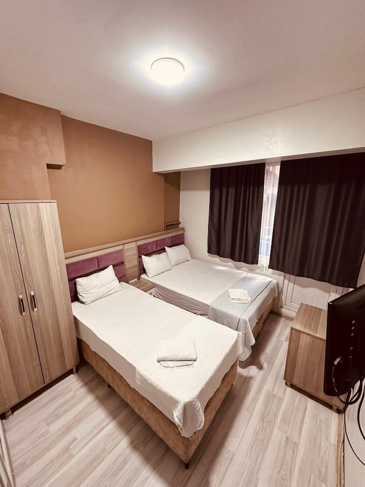 Standard Triple Room, City View photo 1
