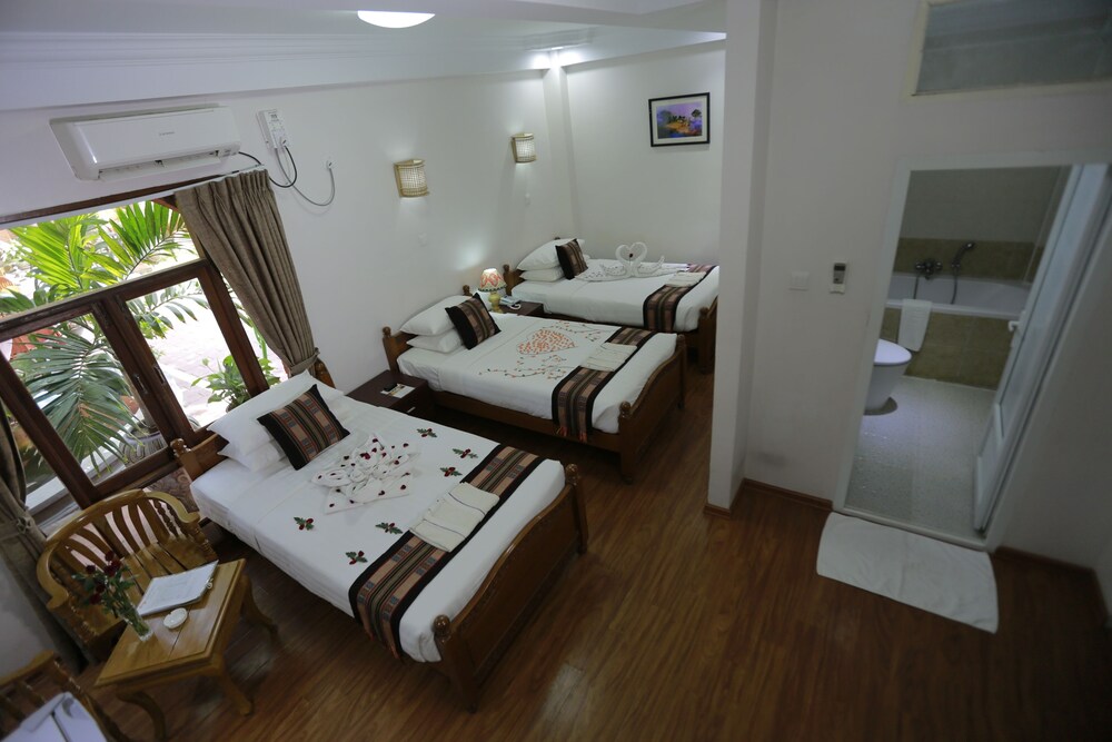Grand Triple Room, 3 Bedrooms, Garden View photo 2
