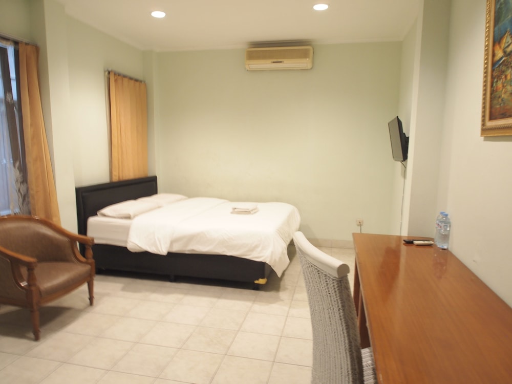 Deluxe Room - Photo 2