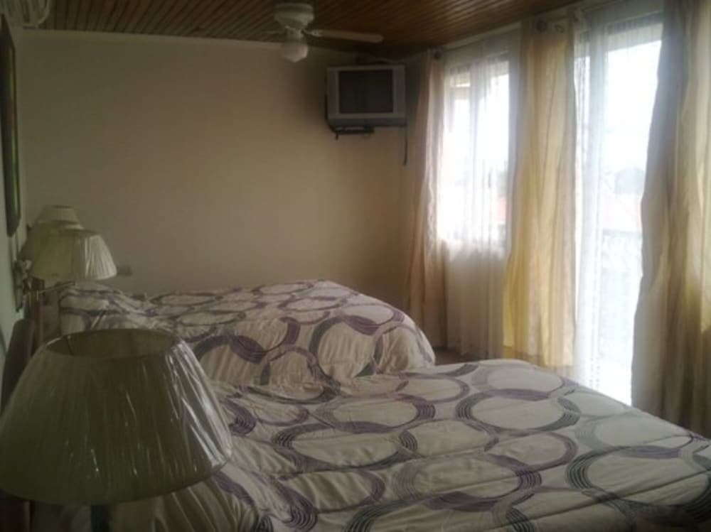 Superior Quadruple Room, 2 Double Beds, Private Bathroom, City View photo 1