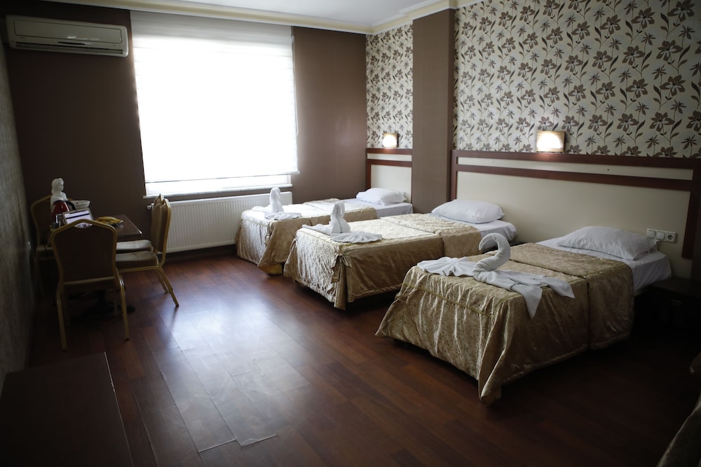 Deluxe Triple Room - Photo 1