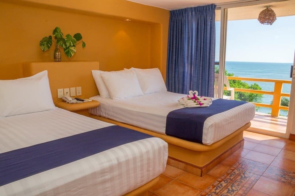 Standard Room, 2 Double Beds, Ocean View - Photo 7