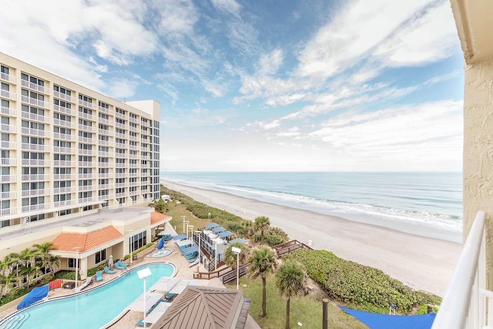 King Bed coastal view w/ full sized balcony photo 2