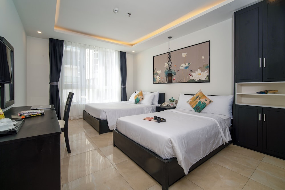 Deluxe Triple Room - Photo 1