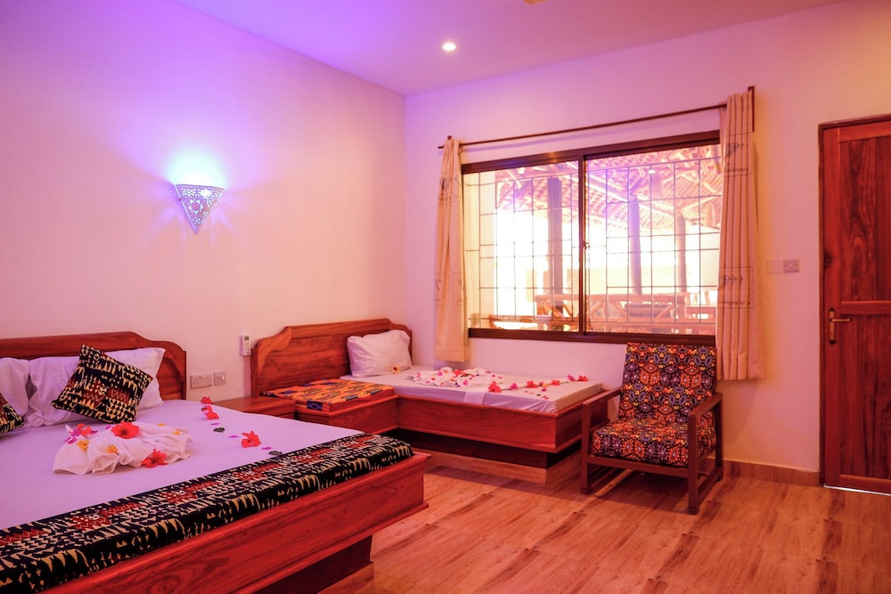 Deluxe Triple Room, Patio, Garden View