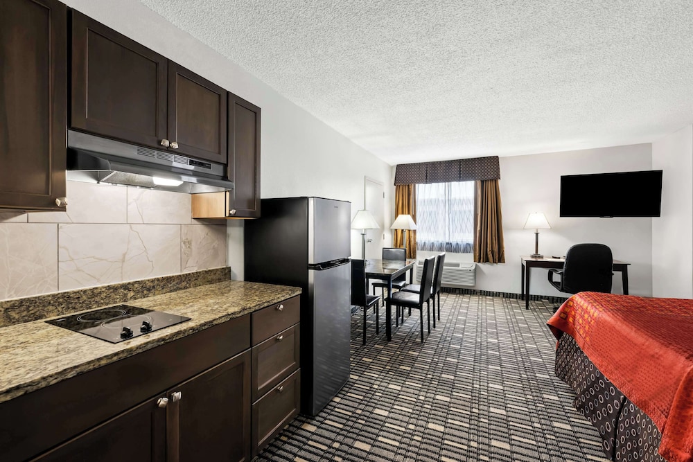 Suite, 1 King Bed, Non Smoking, Refrigerator & Microwave (with Sofabed) - Photo 1
