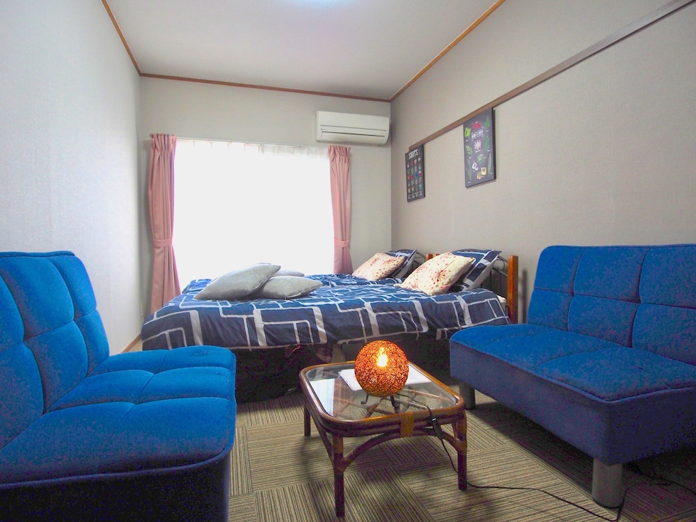 Western Style Room (2 single beds and a sofa bed) E