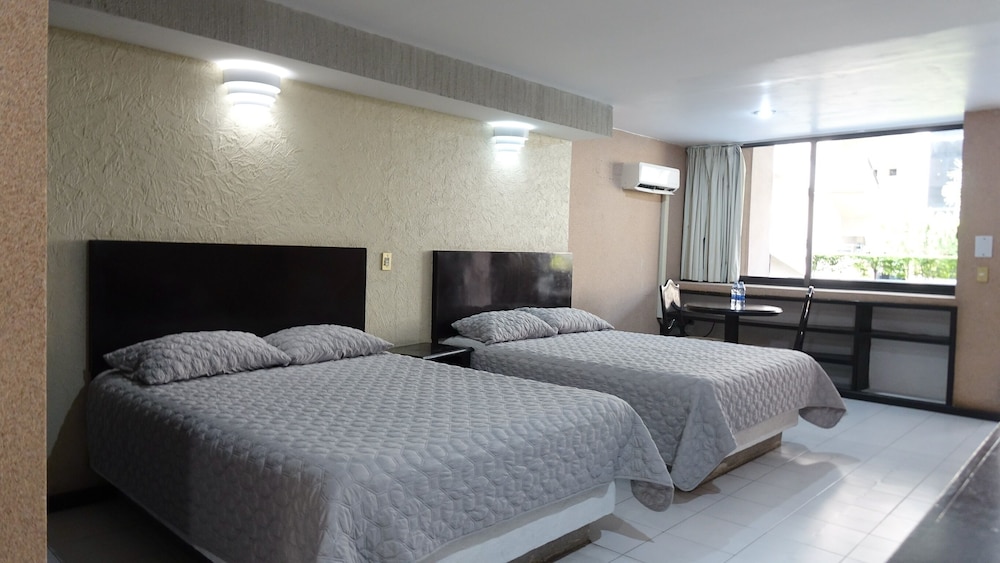 Superior Room, 2 Queen Beds, Balcony, Garden View