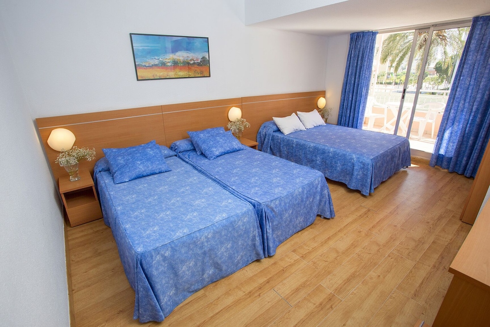 Habitación Cuádruple (2 adultos + 2 niños)
