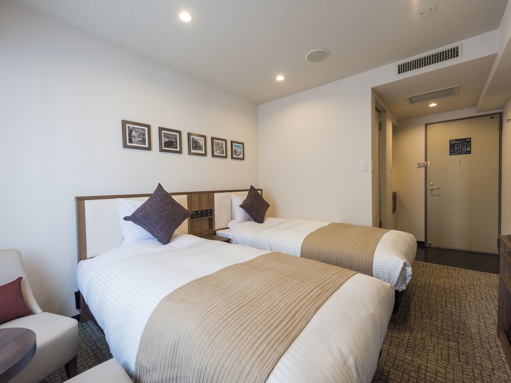 Twin Room, Non Smoking (Eco Plan - No Cleaning Service) photo 3