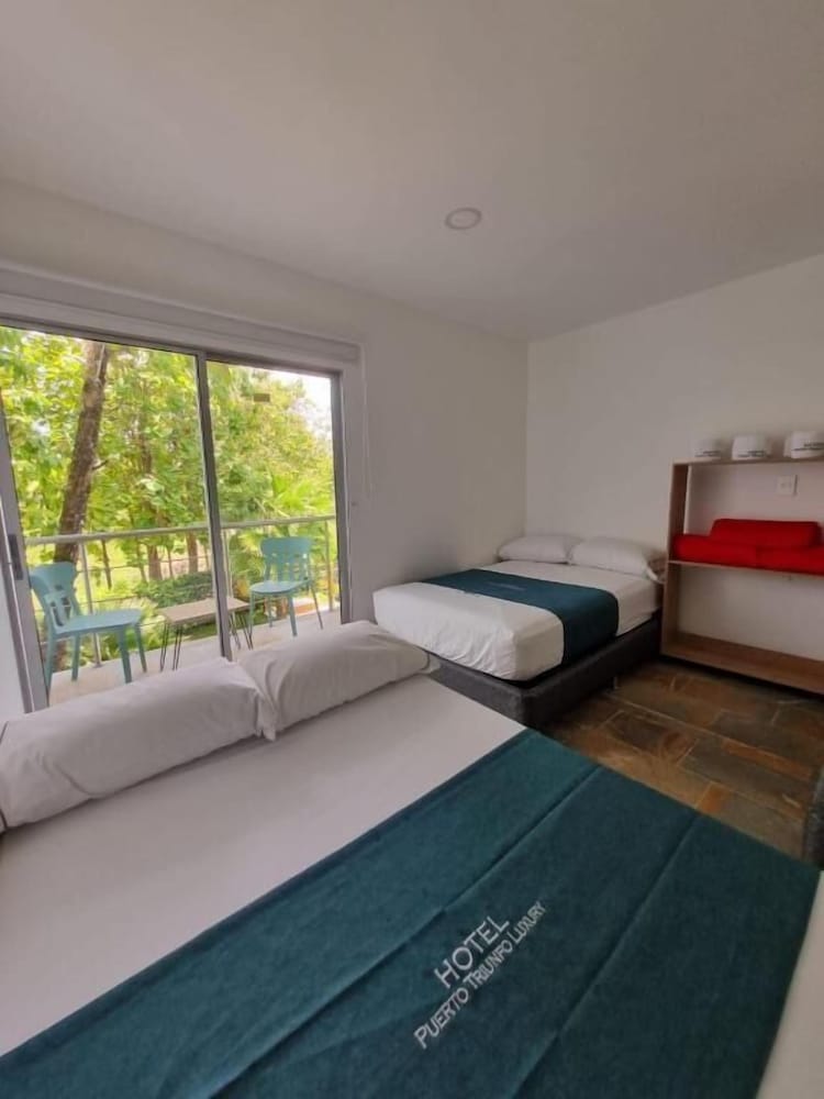Superior Quadruple Room, Balcony, Pool View photo 1