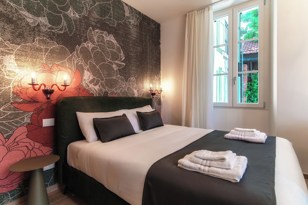 Deluxe Quadruple Room, Partial Lake View photo 2
