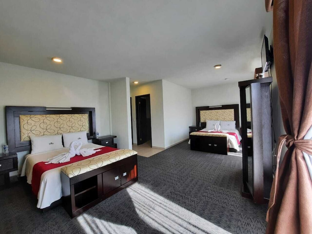 Quadruple Room, 2 Queen Beds, City View photo 1