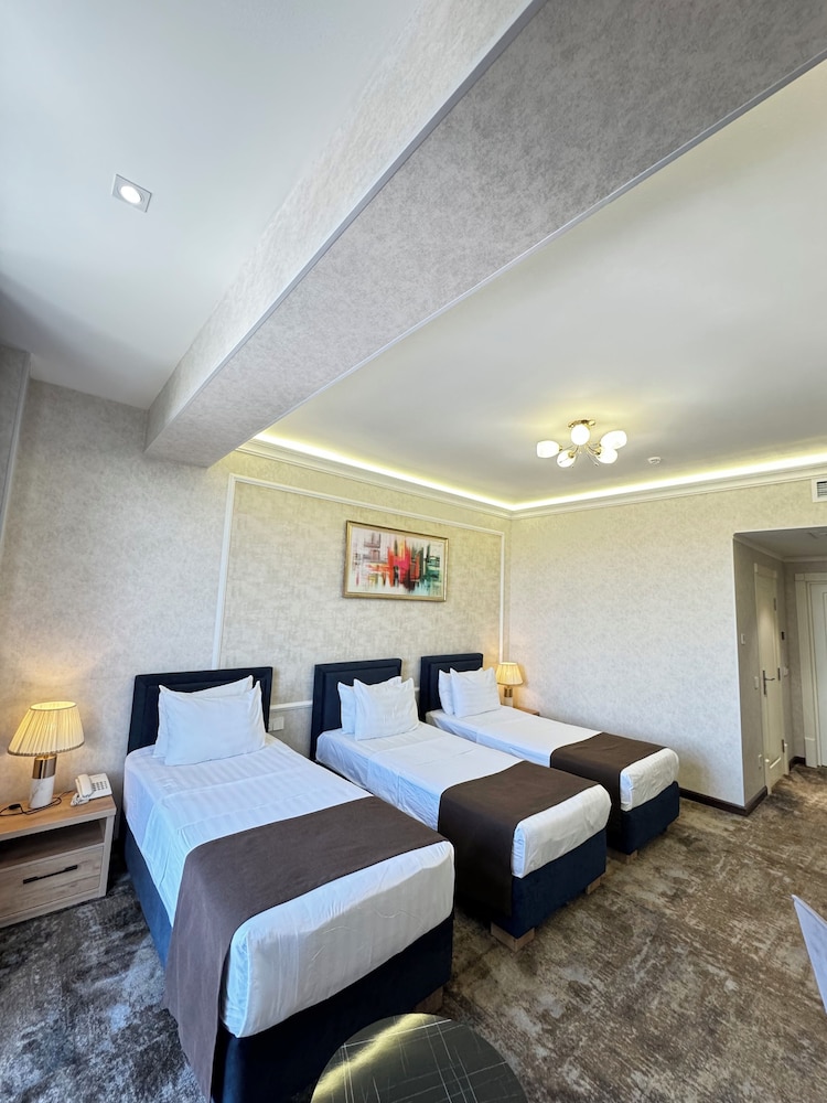 Deluxe Triple Room (Top floor) - Photo 2