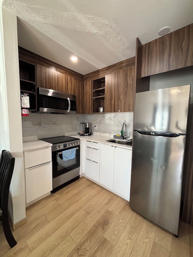 Deluxe Suite, 2 Queen Beds, Kitchen, Ground Floor photo 1