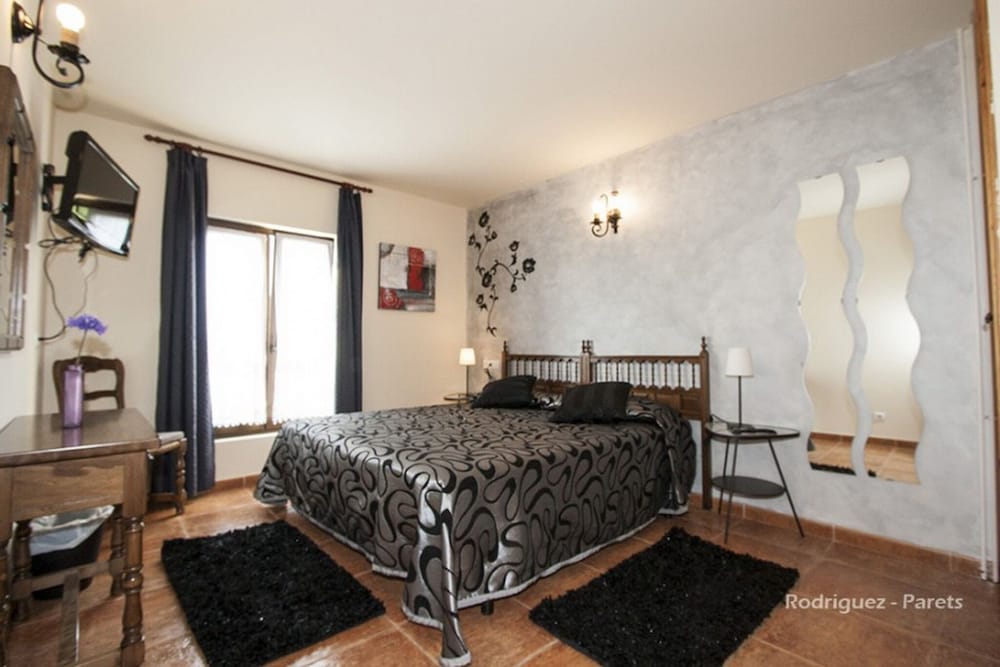 Habitación Cuádruple Estándar, Baño Privado, Vista al Jardín (Dos Supletorias)