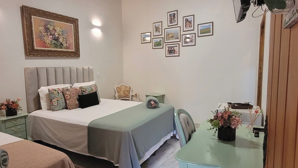 SUITE TRIPLA FLORES DO CAMPO photo 1