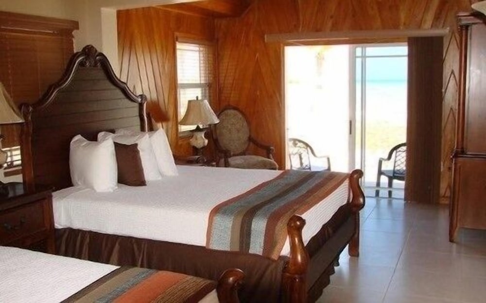 Classic Double Room, 2 Queen Beds, Patio, Beachfront photo 1